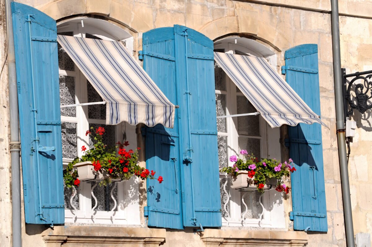 view-blue-wooden-windows-with-pots